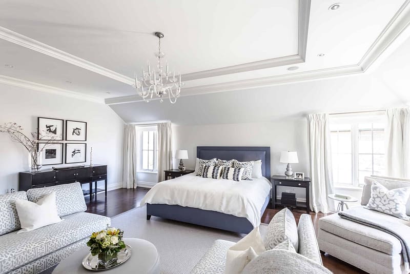 Massive master bedroom with a large blue bed